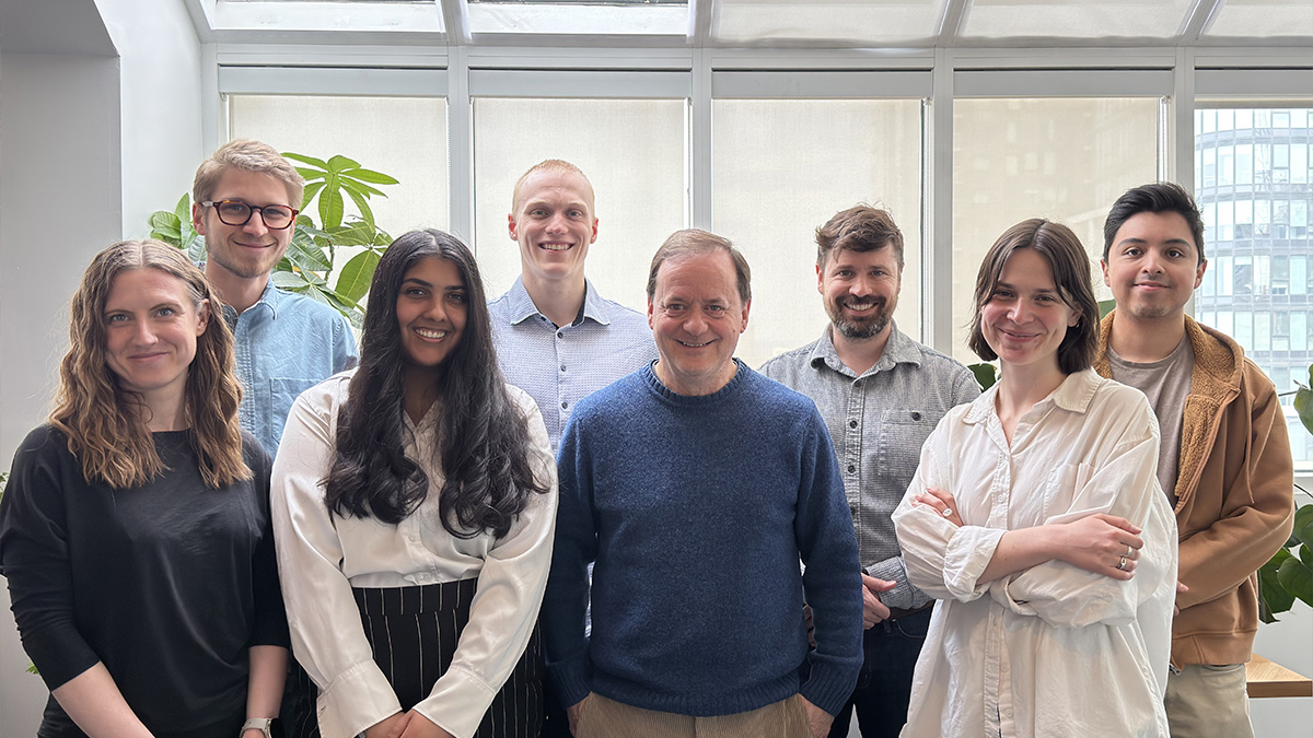 Portrait of the Juxta team in a brightly lit office