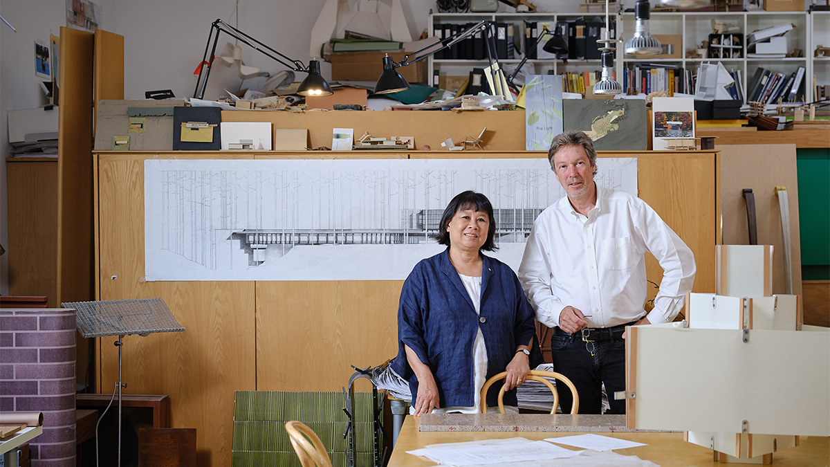 A portrait of Shim and Sutcliffe in their studio