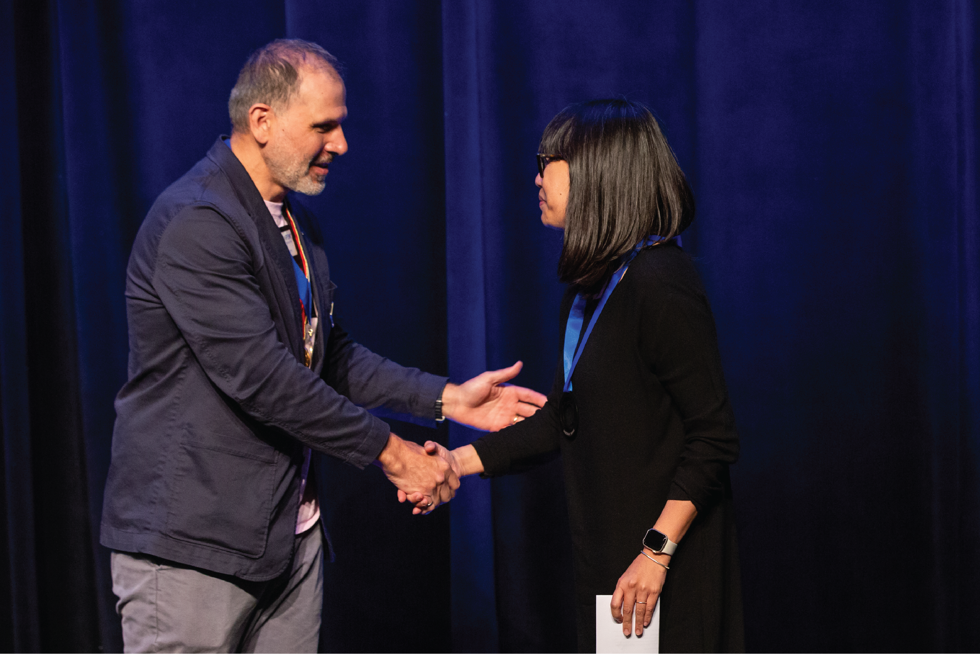 Deborah Wang receives Medal of Service from OAA president Settimo Vilardi