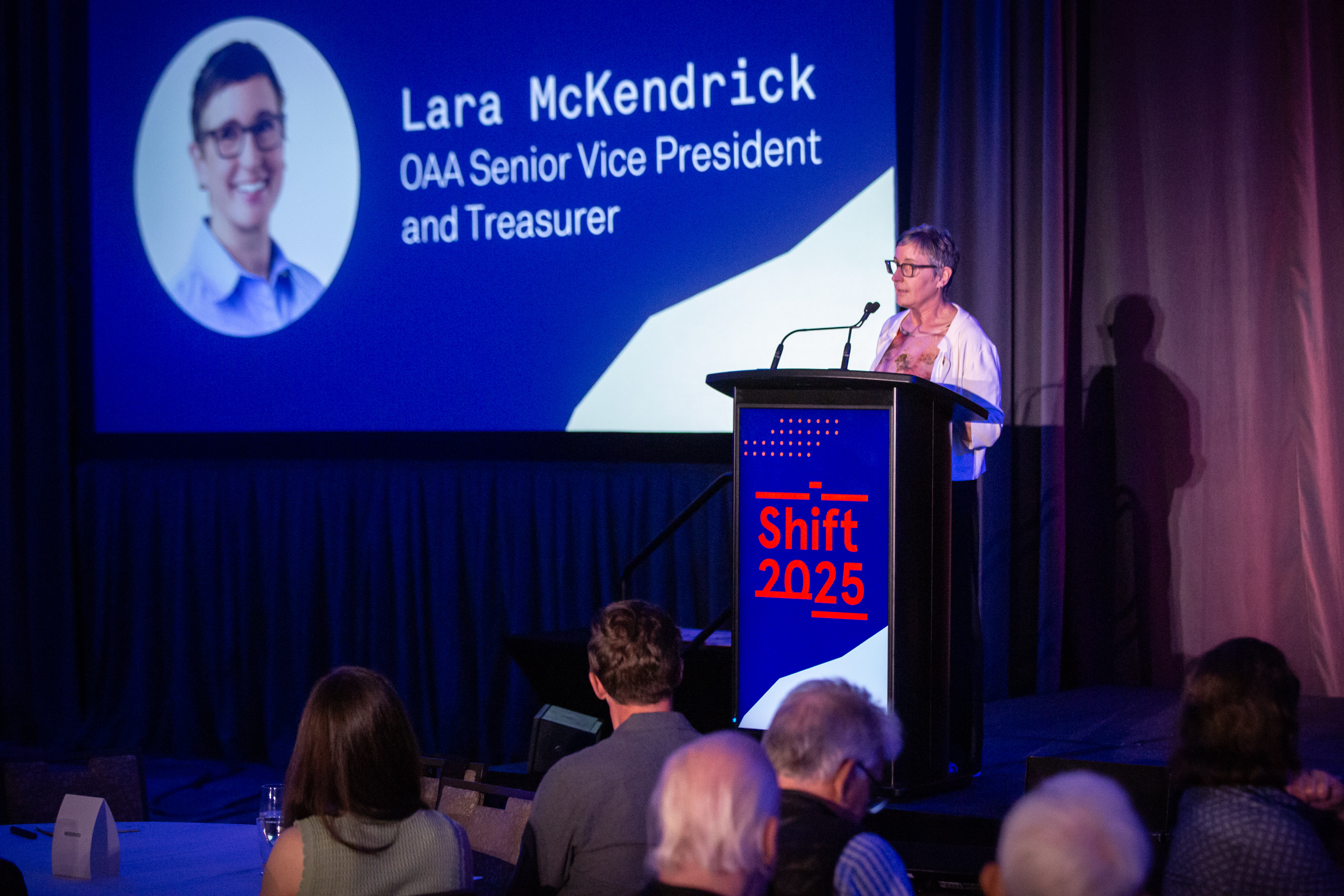 OAA Senior Vice President and Treasurer Lara McKendrick welcomes the crowd