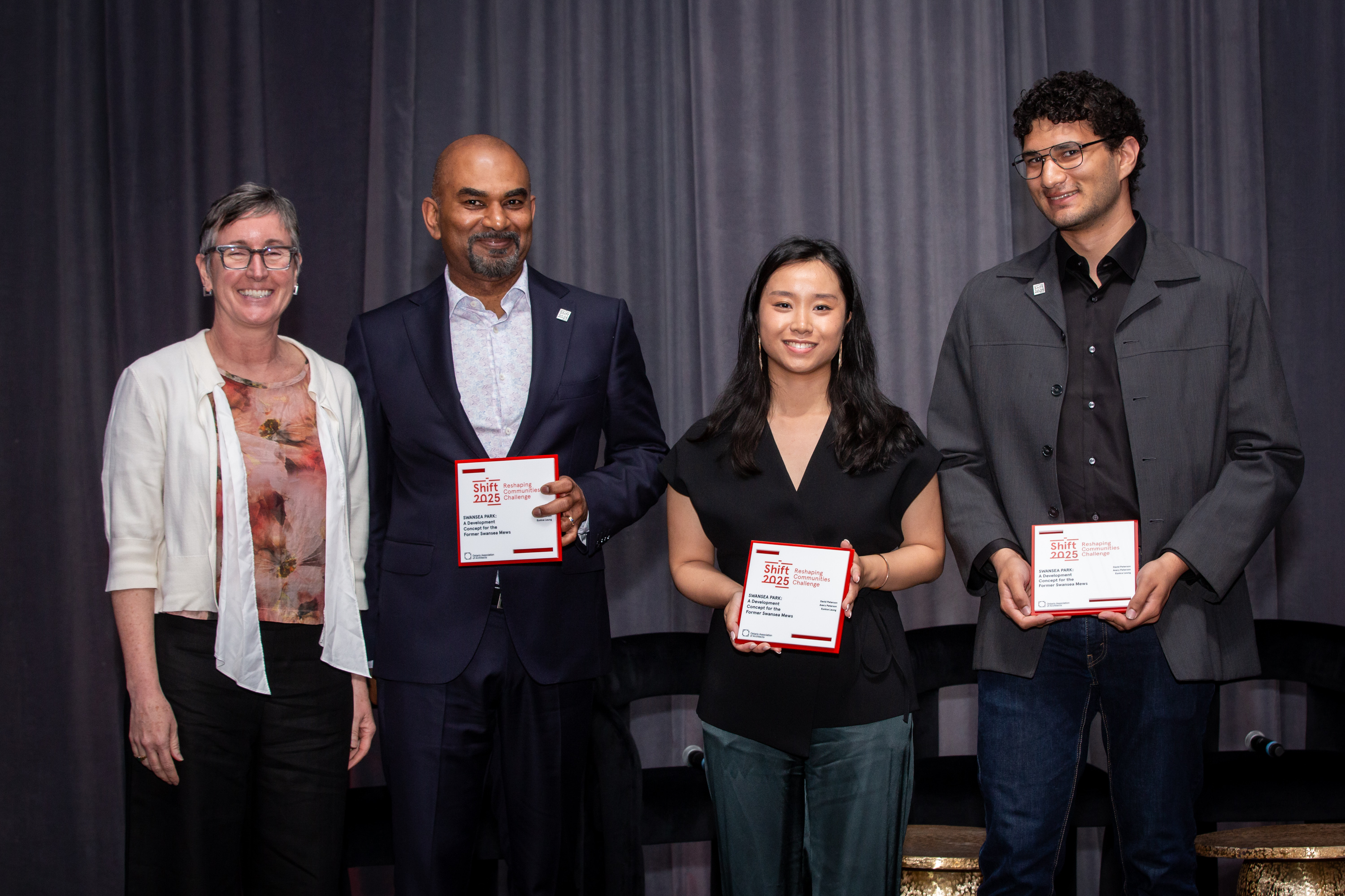 David Peterson, Eunice Leung and Avery Peterson accepting the SHIFT award from OAA Vice President and Treasurer Lara McKendrickk