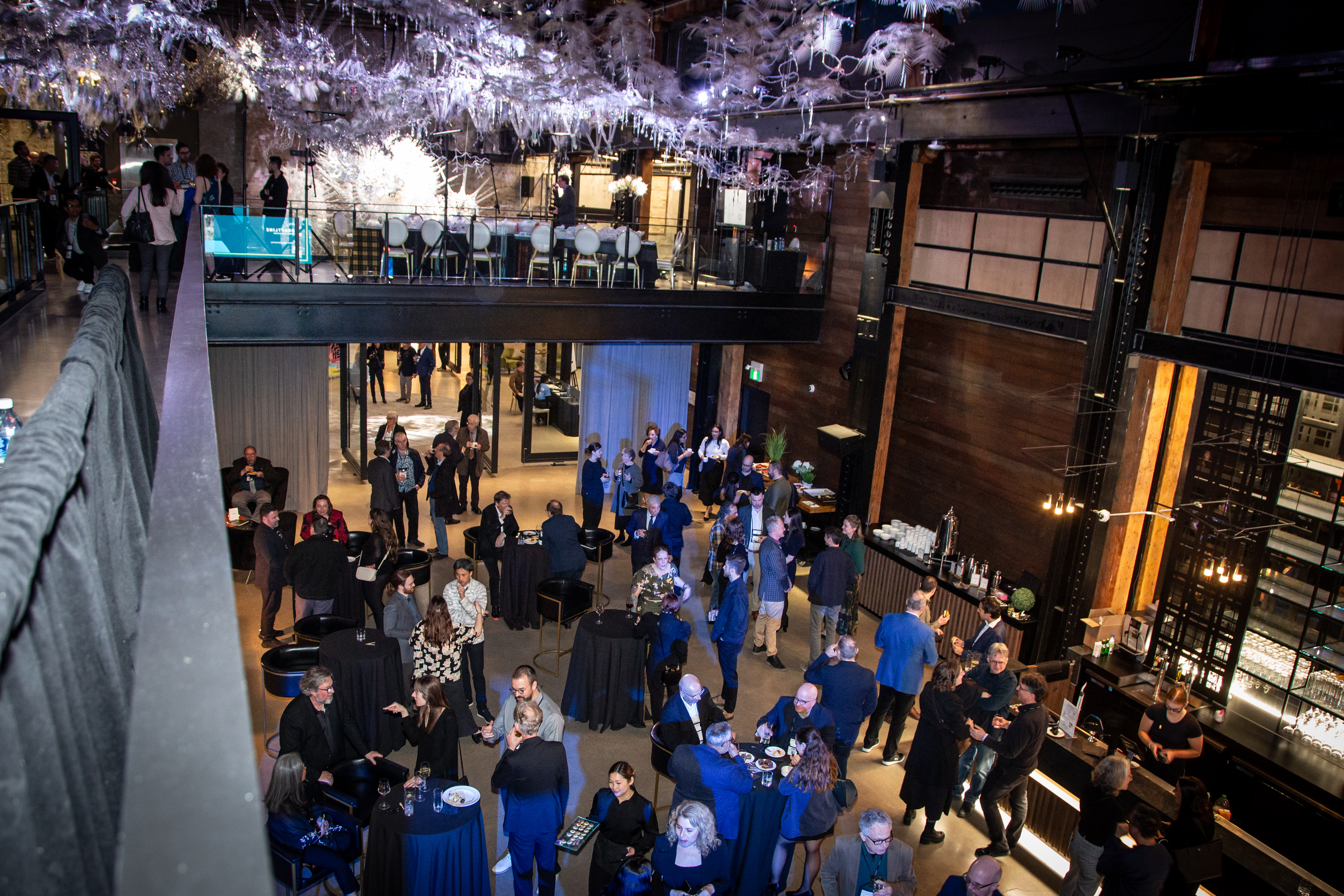 Aerial view of the Grand Hall in Tapestry Hall featuring the "Meander" Living sculpture suspended on the ceiling.