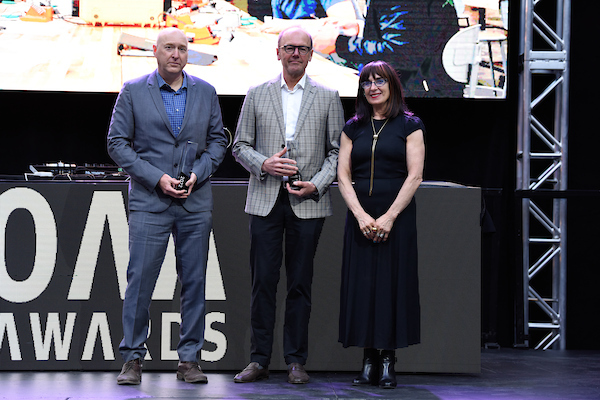 image of Susan Speigel with recipients Robert Allen and Stephen Phillips 