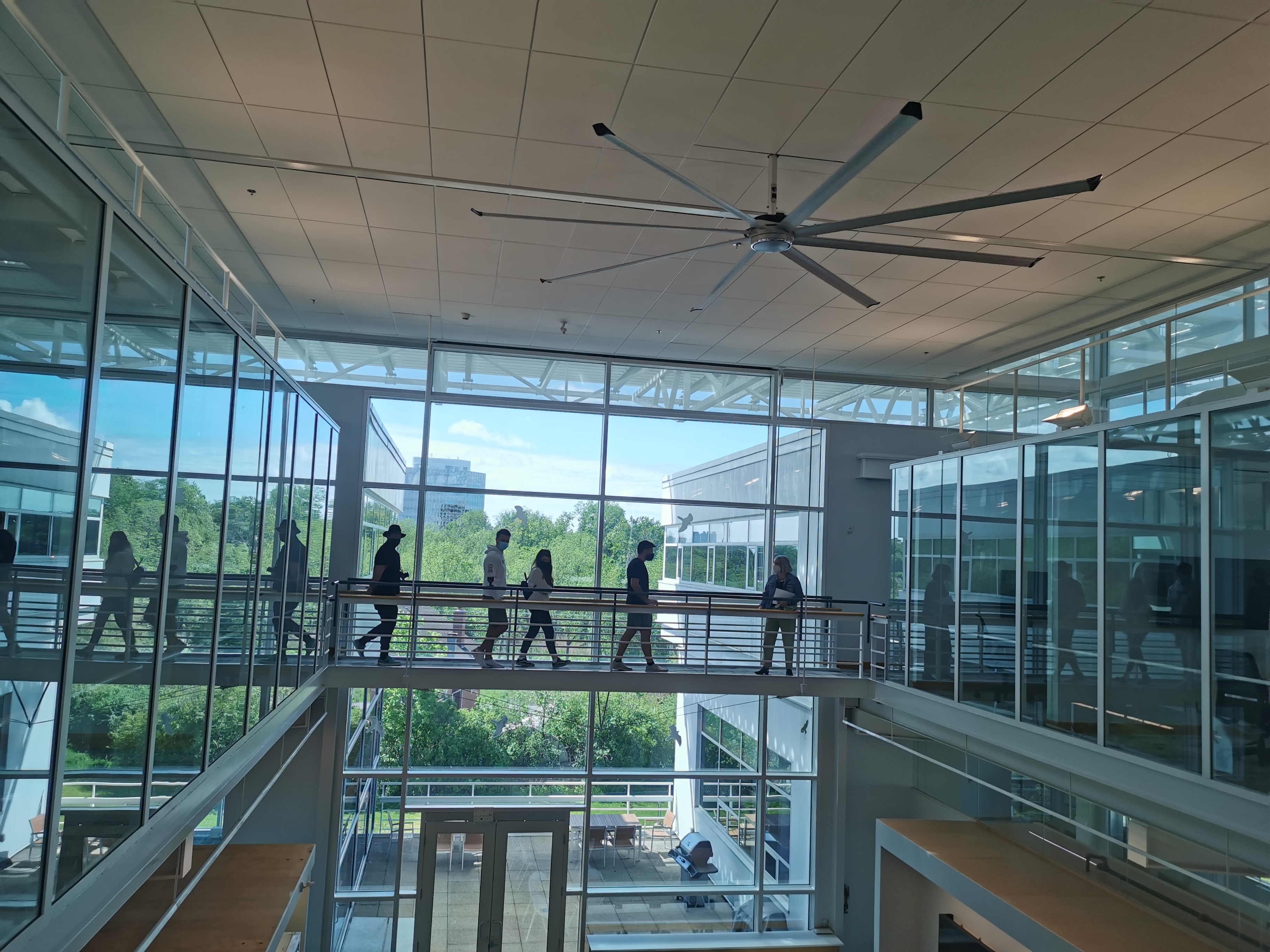 Doors Open guests looking at the view on the 3rd floor bridge at OAA Headquarters