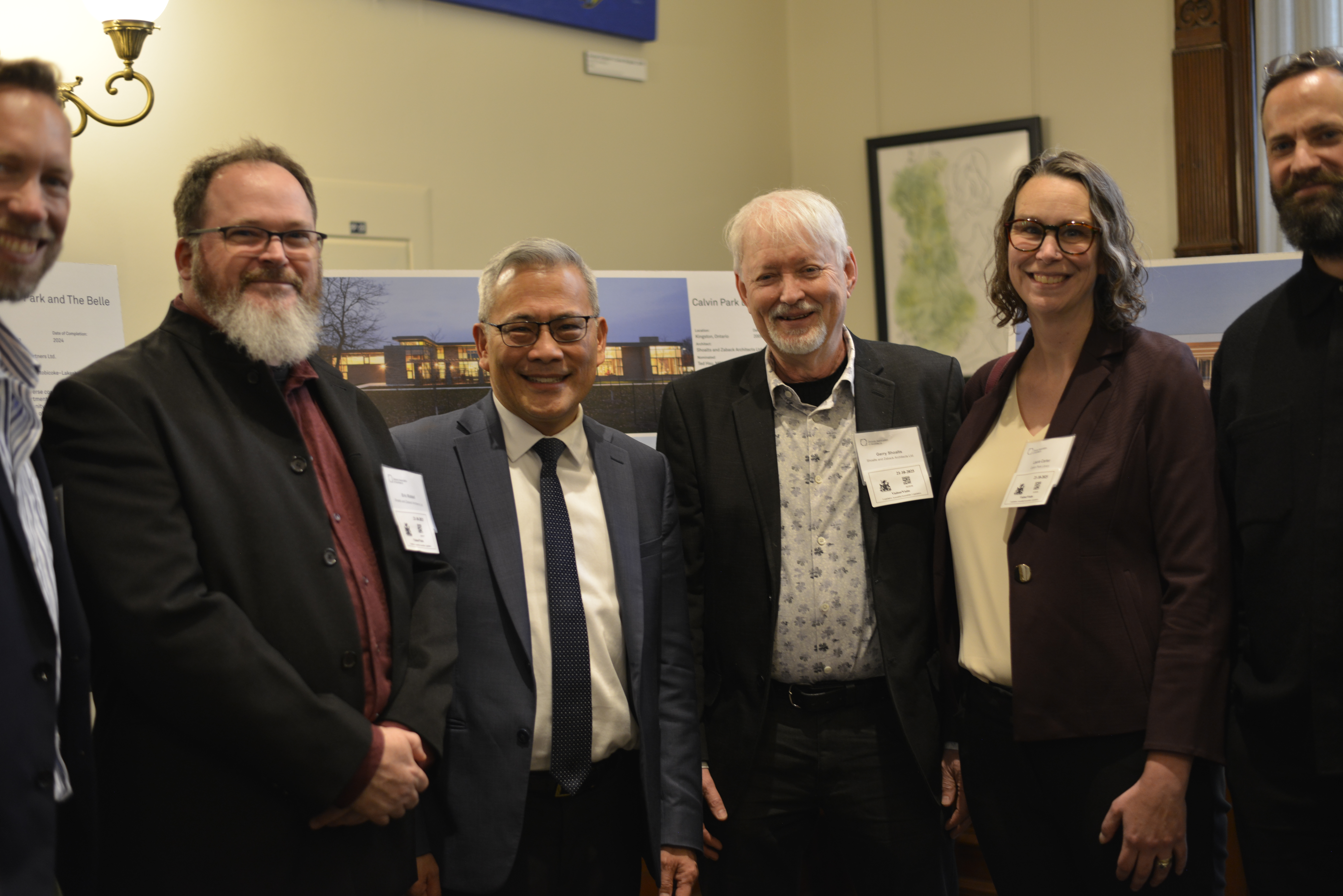 MPP Ted Hsu (Kingston and the Islands) with Gerry Shoalts and Eric Riddell of Shoalts and Zaback Architects Ltd. alongside Calvin Park Library representative, Laura Carter and St. Lawrence Valley Society of Architects representatives, Chris Howard and Lukas Bergmark