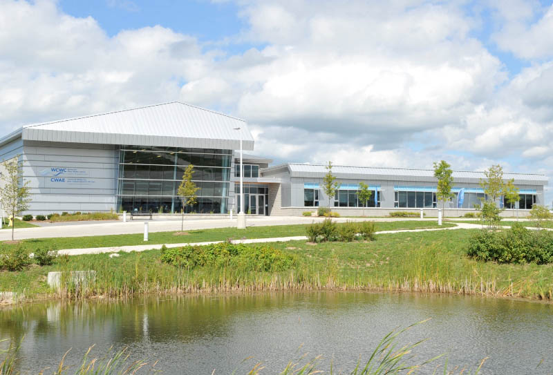 Exterior view of Walkerton Clean Water Centre’s building, a low one storey contemporary building with a large windows 