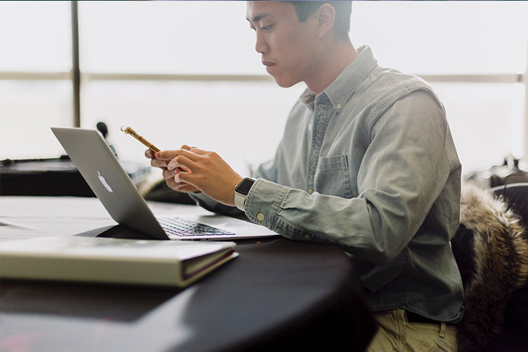 Man working in front of a computer